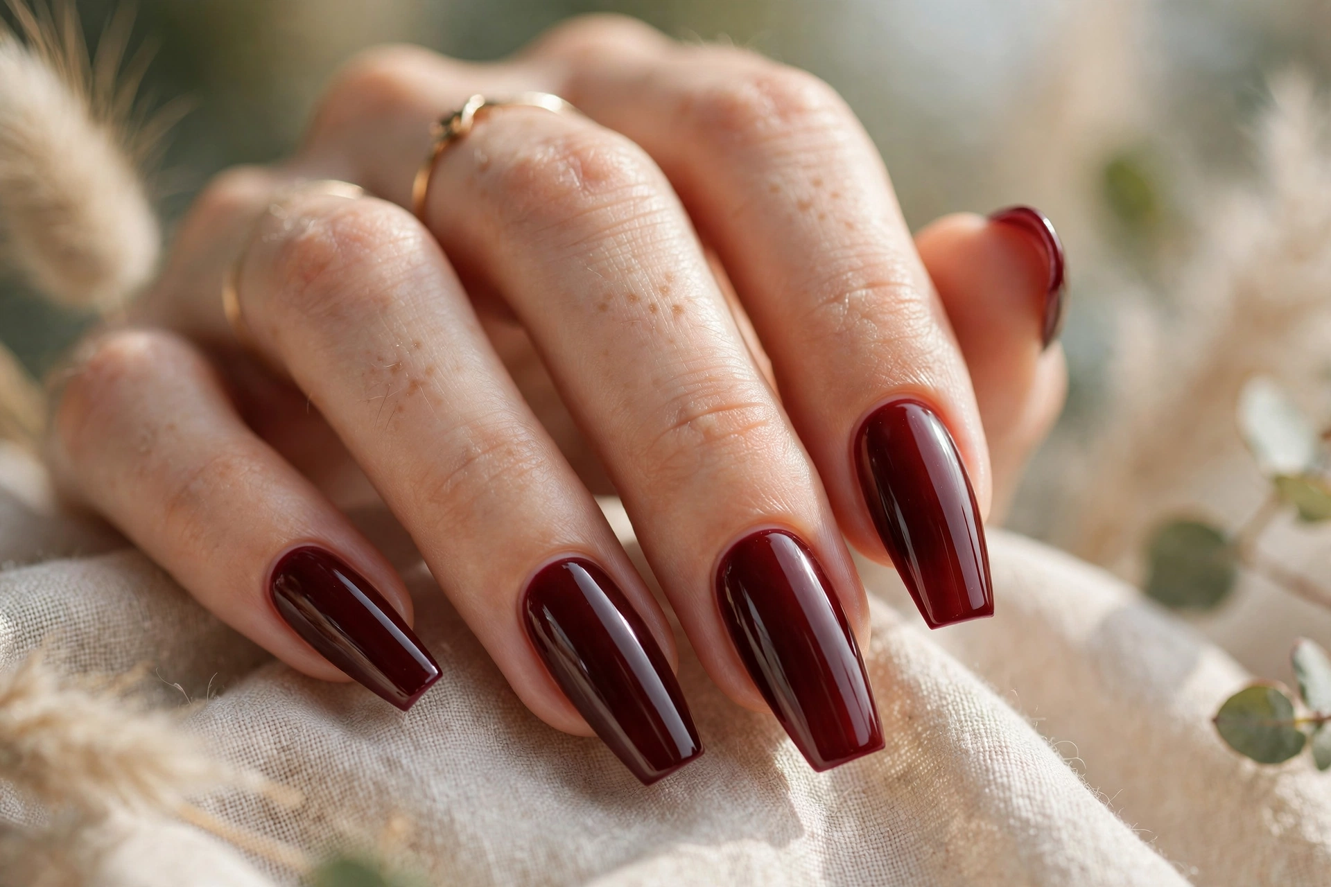 Dark cherry red nail designs on long coffin shaped nails